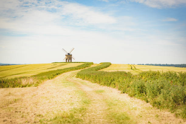 istock Old Windmill in Wheat Field, UK 1034348584