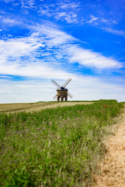 istock Old Windmill in Wheat Field, UK 1034348642