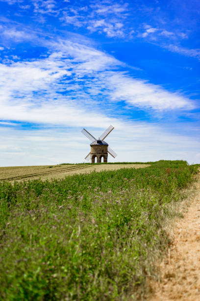 istock Old Windmill in Wheat Field, UK 1034348658