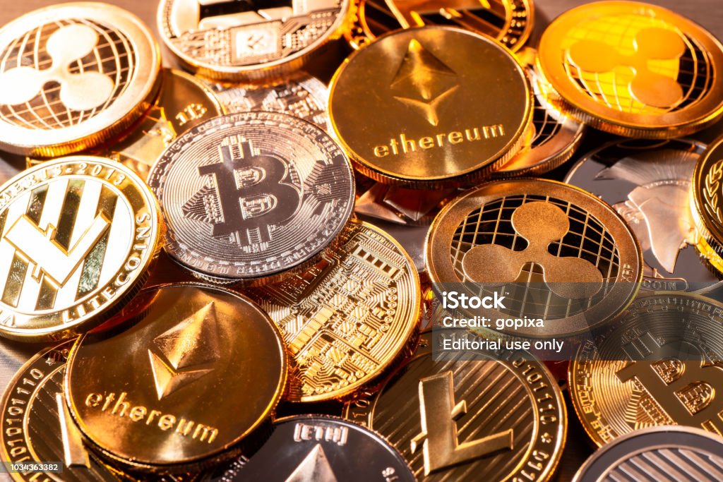 Coins of various cryptocurrencies Frankfurt, Hesse, Germany - April 17, 2018: Many coins of various cryptocurrencies Cryptocurrency Stock Photo