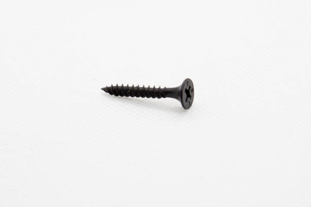 istock close up view of a black screw 1034364168