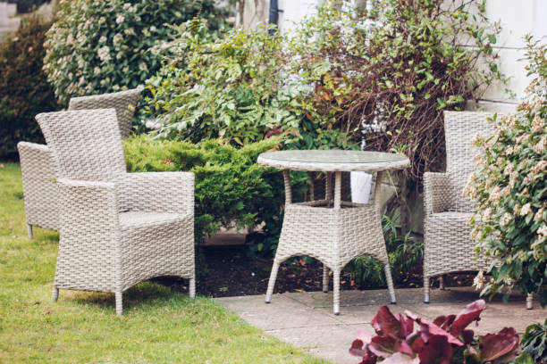 istock garden chairs and table in the countryside 1034364228