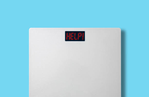 istock isolated weight scale measurement with word help 1034368132