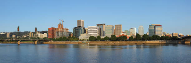istock Portland Skyline - Willamette River - Oregon 1034369378