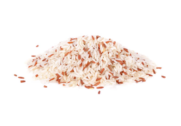istock pile of Thai red and white Jasmine rice on white background 1034369910