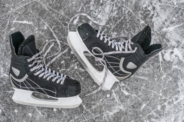 istock Pair skates on the ice rink 1034372956