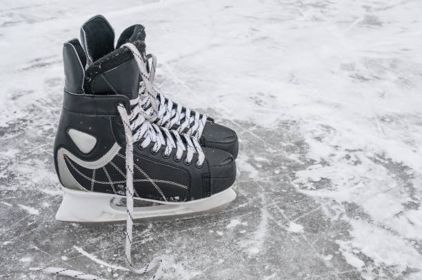istock Pair skates on the skating rink 1034373024