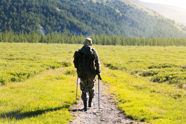 istock A tourist in a hike in the mountains. 1034373366