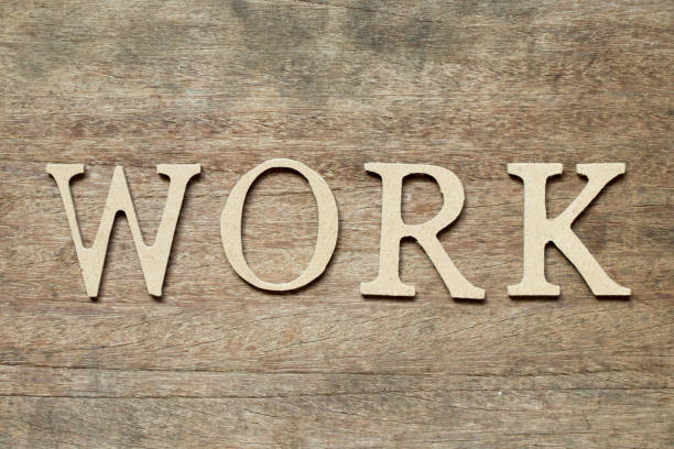 istock English alphabet in word work on wood background 1034379044