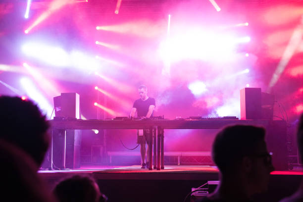 istock Dj playing music on the stage 1034379210