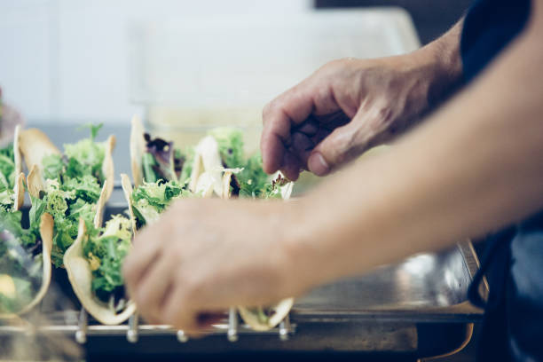 Chef hands preparing spanish tapas