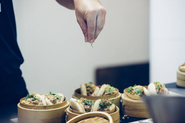 istock Chef hand prepares spanish tapas in close up 1034386368