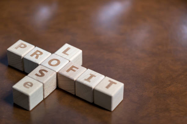 istock Wooden block stack business concept, profit and lose letters. 1034390992