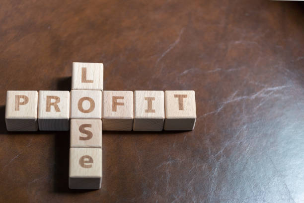 istock Wooden block stack business concept, profit and lose letters. 1034391014