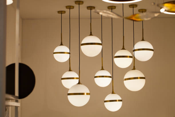 istock Beautiful chandelier. luxury expensive chandelier hanging under ceiling 1034391056