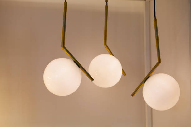 istock Beautiful chandelier. luxury expensive chandelier hanging under ceiling 1034391058