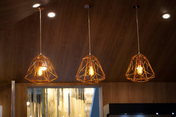 istock Beautiful chandelier. luxury expensive chandelier hanging under ceiling 1034391126
