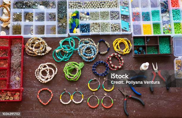 Colorful Beads On Wooden Table Stock Photo - Download Image Now - Jewelry, Making, Craft