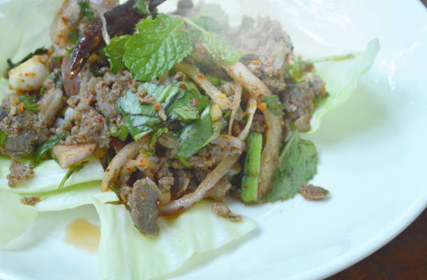 istock Thai spicy chop duck meat salad and fresh cabbage 1034394342
