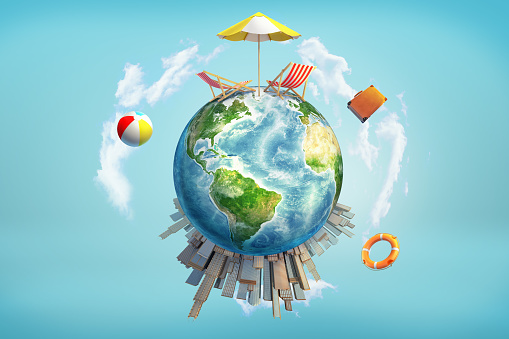 3d rendering of a Earth globe with a sun umbrella and lounge chairs on its upper surface and skyscrapers on the bottom surface.