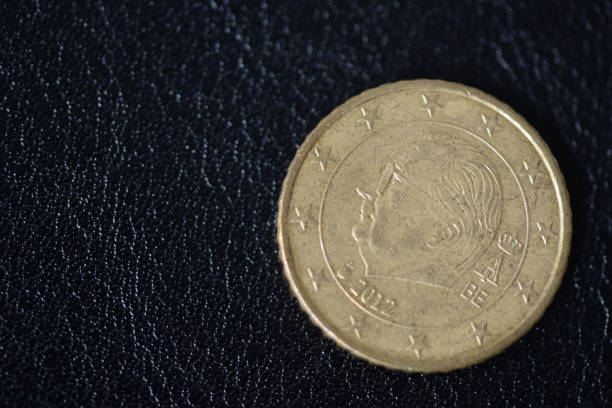 istock Fifty euro cents on a dark background close up 1034408676