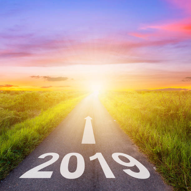 istock Empty asphalt road and New year 2019 concept. Driving on an empty road to Goals 2019. 1034411542