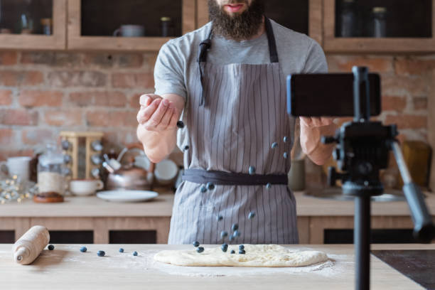 istock content creation media food blogger shoot video 1034411630