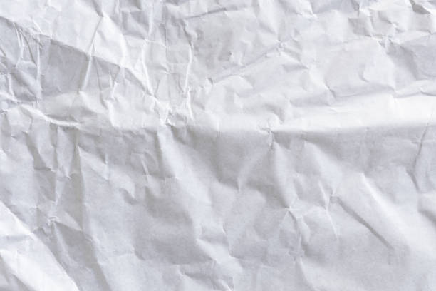 istock Old paper crumpled vintage background and texture with space 1034413786