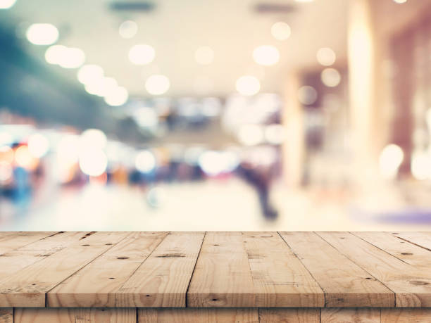 istock Empty wooden table and abstract blurred image background display montage for product. 1034415016
