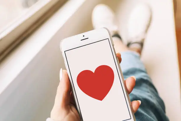 Photo of Heart & love on a mobile phone