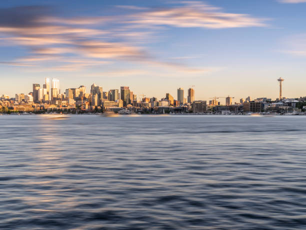 istock Seattle downtown skyline by river at sunset 1034426918