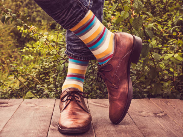 istock Office manager and bright, colorful, funny socks 1034428066