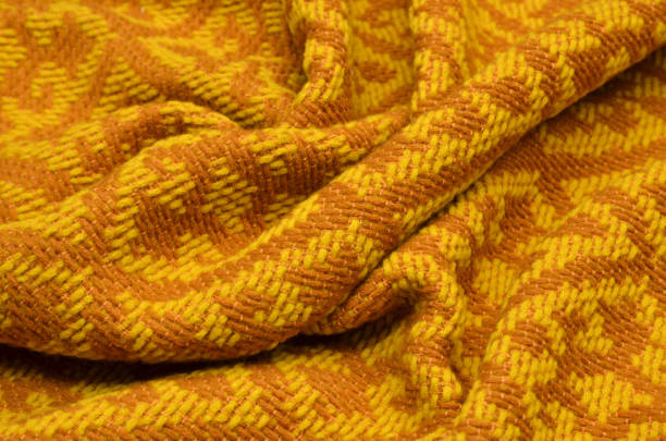 istock Woolen fabric with viscose yellow-brown color 1034431088