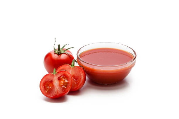 istock Tomato sauce with fresh ripe tomatoes isolated on white background 1034431282