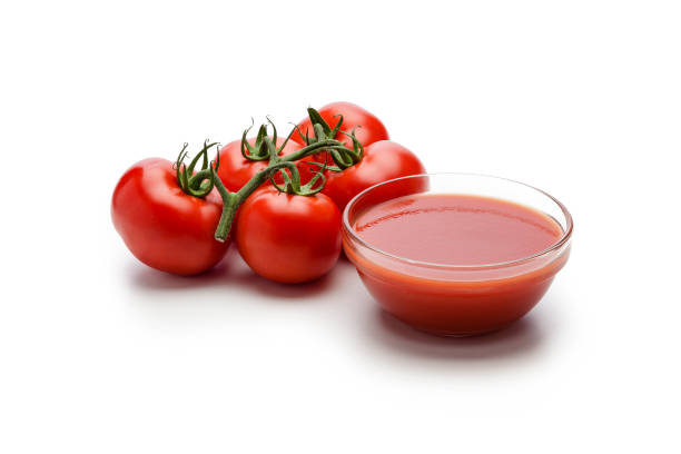istock Tomato sauce with fresh ripe tomatoes isolated on white background 1034431294