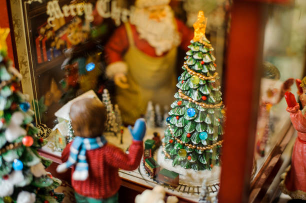 istock Christmas toy decorative composition consisting of a boy looking through the window 1034435348