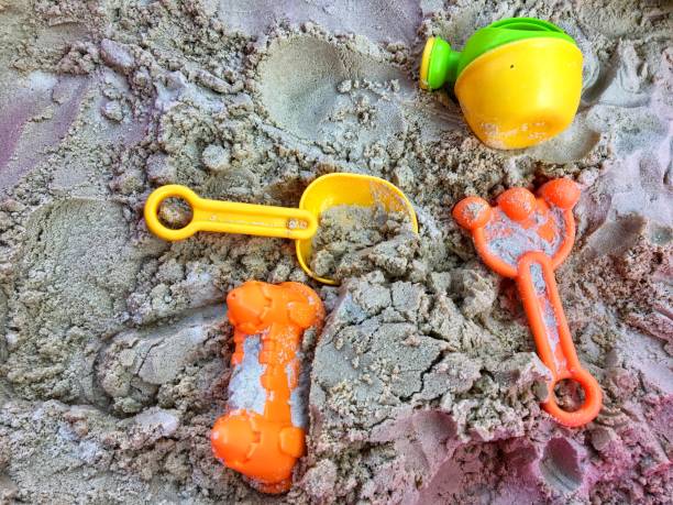 istock Kids sand toys on sand 1034439180