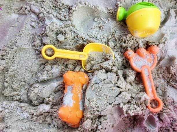 istock Kids sand toys on sand 1034439202