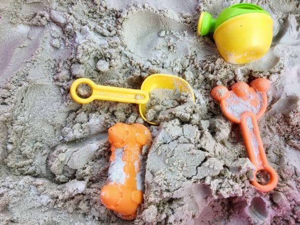 istock Kids sand toys on sand 1034439212