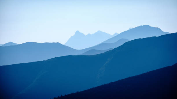istock mountain top panorama in  autumn covered in mist or clouds 1034442034