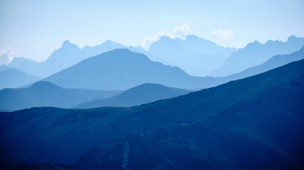 istock mountain top panorama in  autumn covered in mist or clouds 1034442136