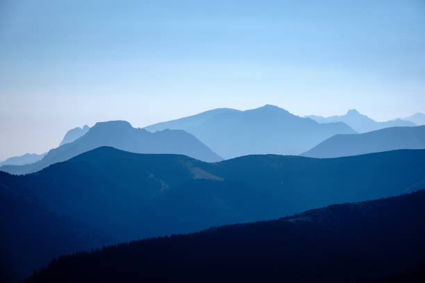istock mountain top panorama in  autumn covered in mist or clouds 1034442158