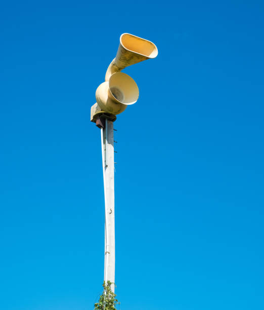 old mechanical civil defense siren, also known as air-raid siren or tornado siren - air raid imagens e fotografias de stock