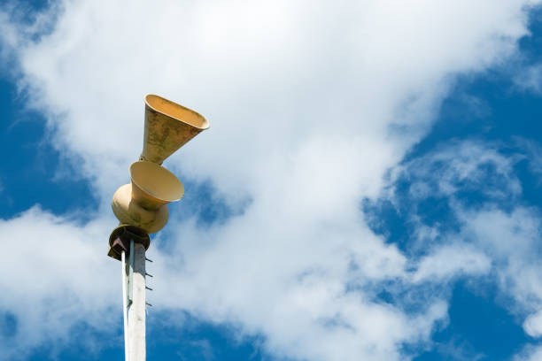 old mechanical civil defense siren, also known as air-raid siren or tornado siren - air raid imagens e fotografias de stock