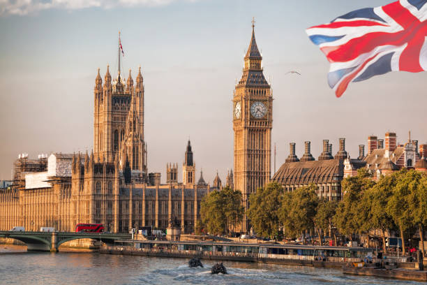 istock Big Ben with boats in London, England, UK 1034448044