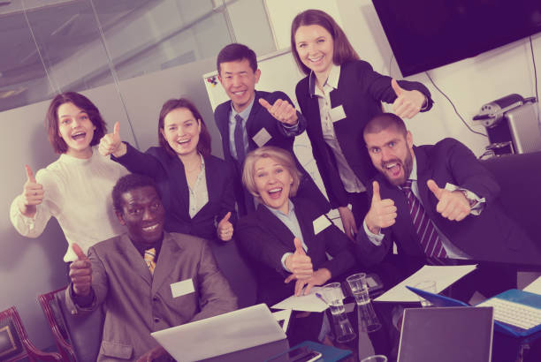 istock international team emotionally gesturing and celebrating 1034451444