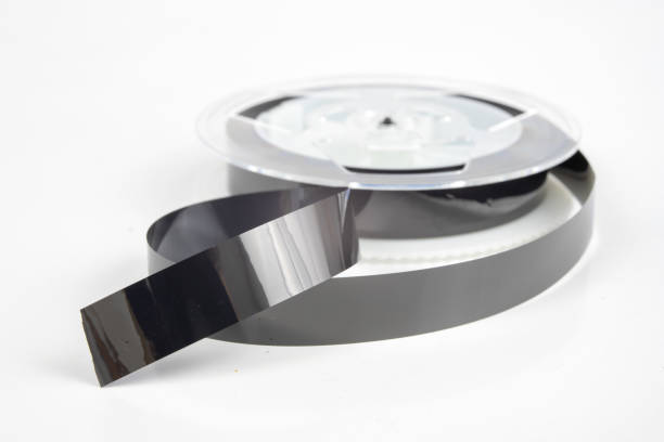 istock Old VHS cassette with unwound tape. Damaged data medium for old home picture and sound recording devices. 1034454868