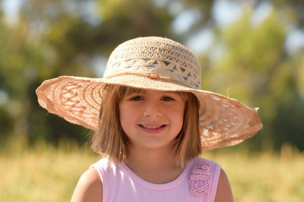 istock Young Girl in a Cornfield 1034454950