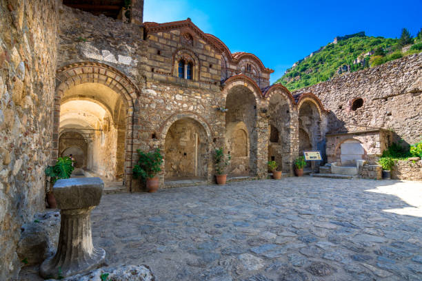 Ruins and churches of the medieval Byzantine ghost town-castle of Mystras, Peloponnese, Greece Ruins and churches of the medieval Byzantine ghost town-castle of Mystras, Peloponnese, Greece sparta greece stock pictures, royalty-free photos & images