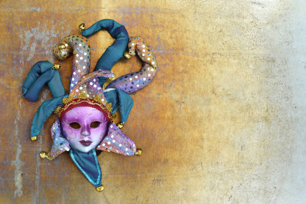 istock Venetian carnival mask on grunge background 1034477694